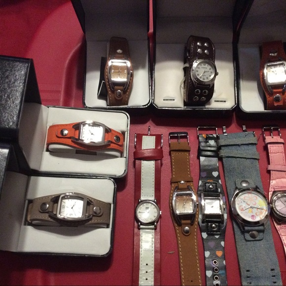 Lot of 17 mostly unworn leather look band watches. main image 3